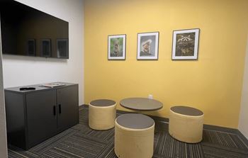 Fitness center with adjacent children's play place